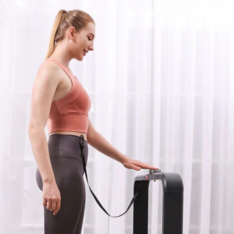 Woman turning the smart control dial on the WalkingPad X21 Foldable Treadmill