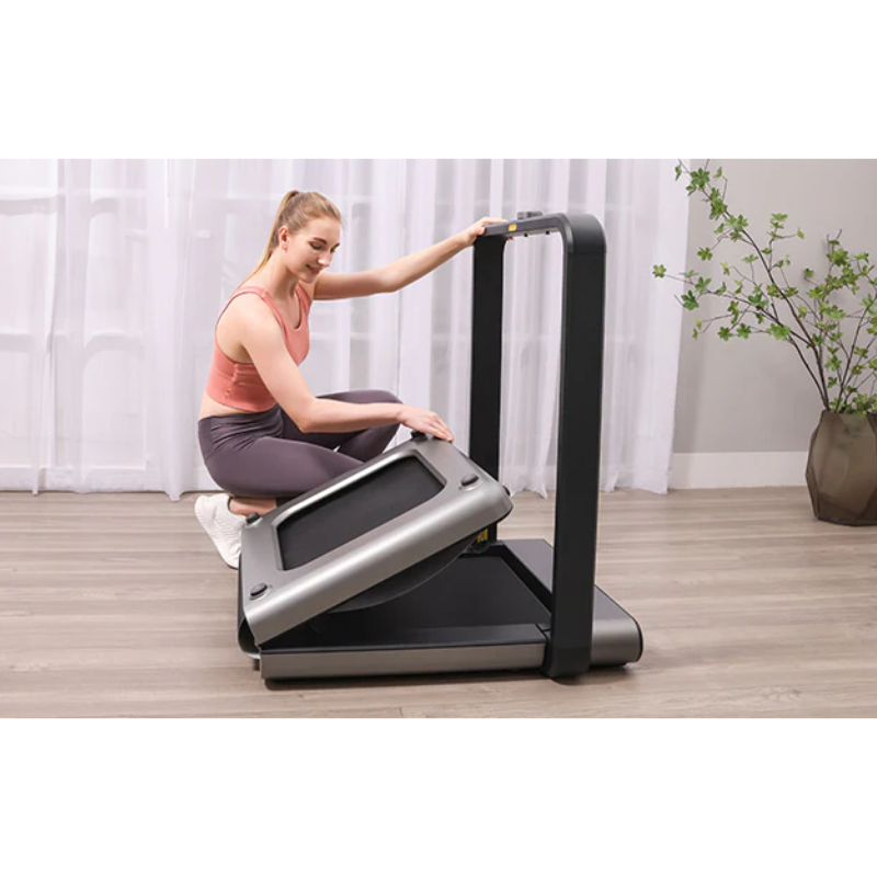 Woman folding up the WalkingPad X21 Foldable Treadmill