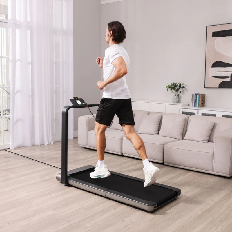 Man running on the WalkingPad X21 Foldable Treadmill