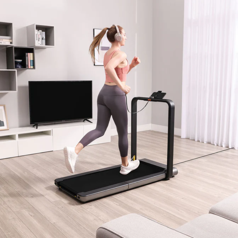 Woman running on the WalkingPad X21 Foldable Treadmill