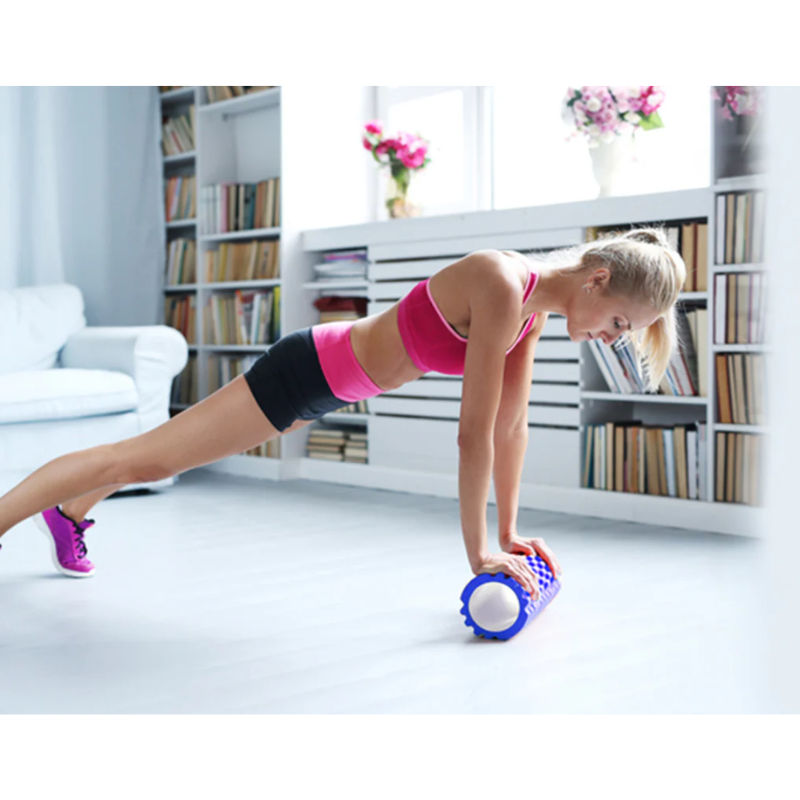 Woman exercising with the Lifespan Fitness Grid Foam Roller